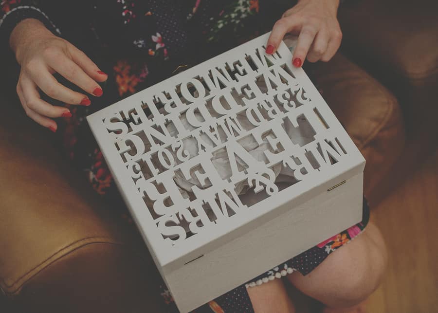 The bride opens her box of gifts