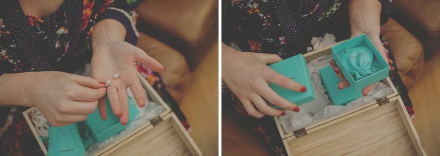 The bride opens a small box