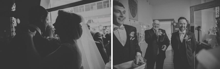 The bride kisses her brother inside the door of the church