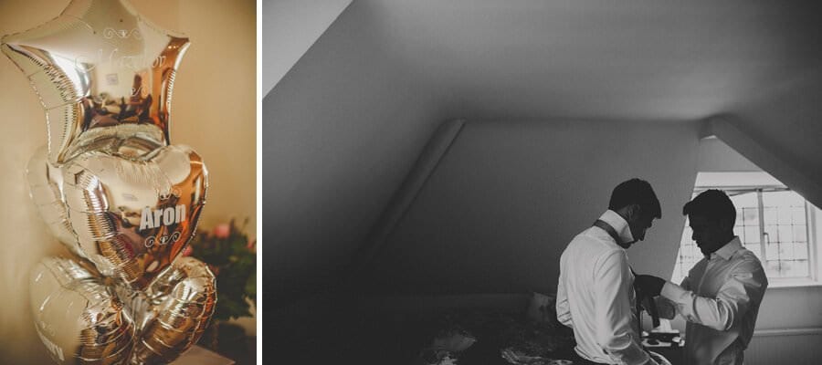 The grooms brother straightens the grooms tie