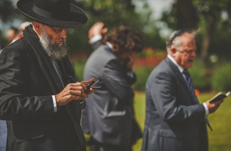 A jewish man reads out a prayer