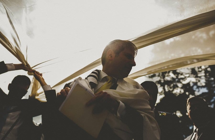 A man waits for the bride and groom