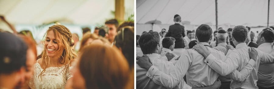 The wedding party dance together in the marquee at brook farm