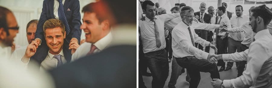 A man carries his son on his shoulders in the marquee at brook farm