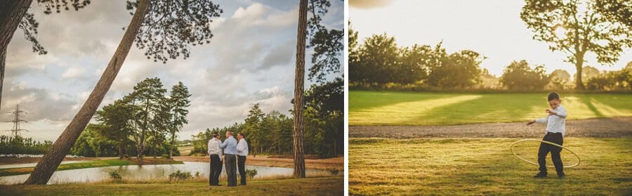 Jewish men stand next to the lake at Brook farm