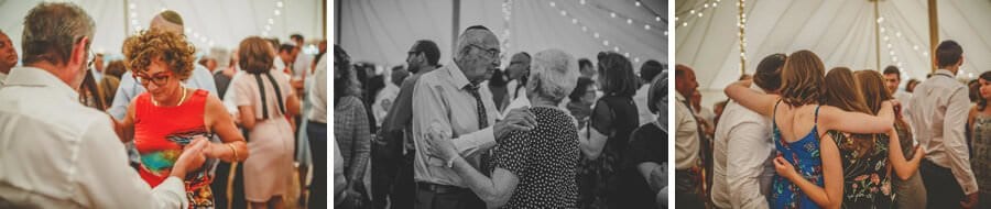 Wedding guests on the dancefloor in the marquee