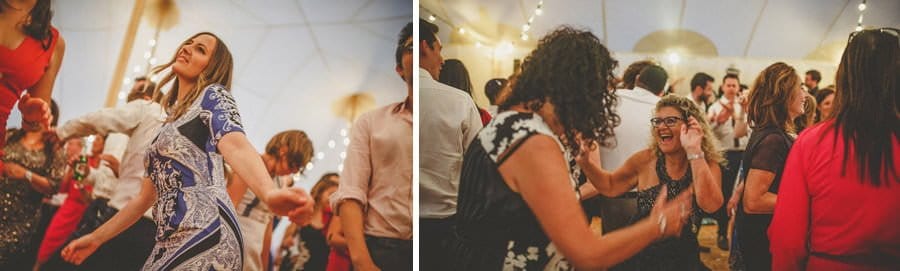 Wedding guests on the dancefloor in the marquee at Brook farm