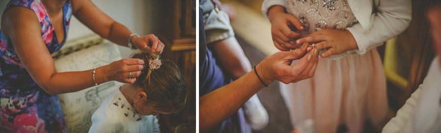 A flower girl puts on her ring