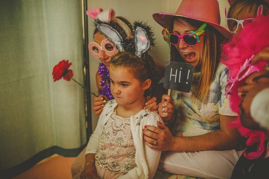 Guests in the photo booth having their photographs taken