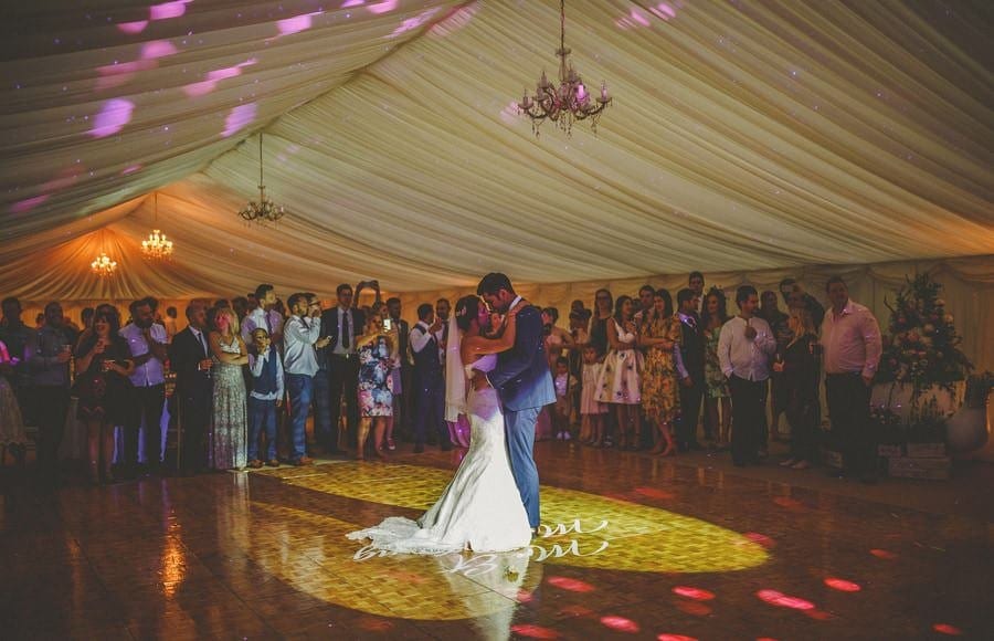 The bride and grooms first dance in the marquee at the old bridge petherton