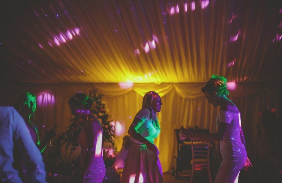 A bridesmaid on the dancefloor in the marquee