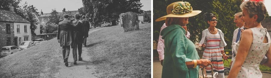 The groom and the ushers walk up to the church