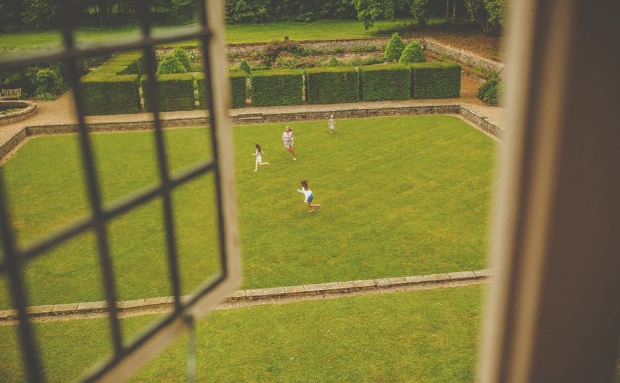 Children play on the front lawn at Voewood