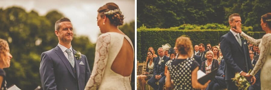 The bride and groom face each other during the wedding ceremony