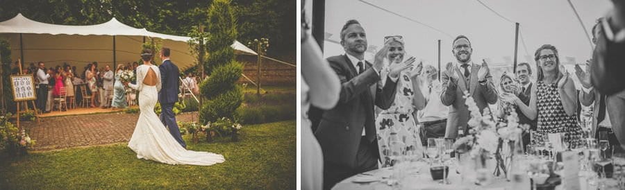 The bride and groom enter the marquee at Voewood