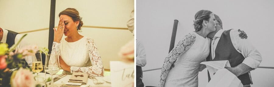 The bride places her hand on her face as she listens to her fathers speech