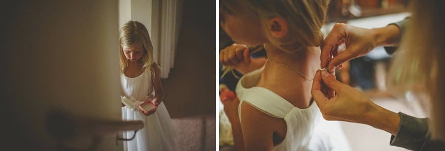 A flower girl opens her present