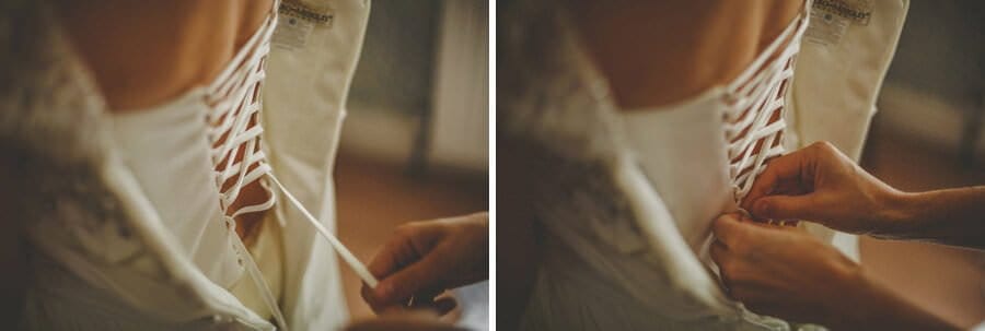 Fastening the back of the wedding dress