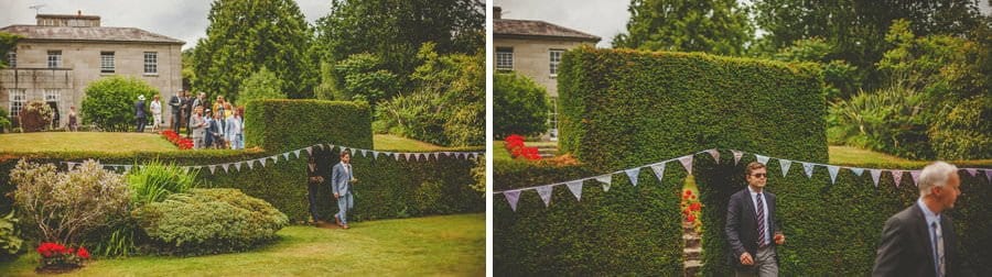 The groom walks through the gardens at Cole Hayes Park
