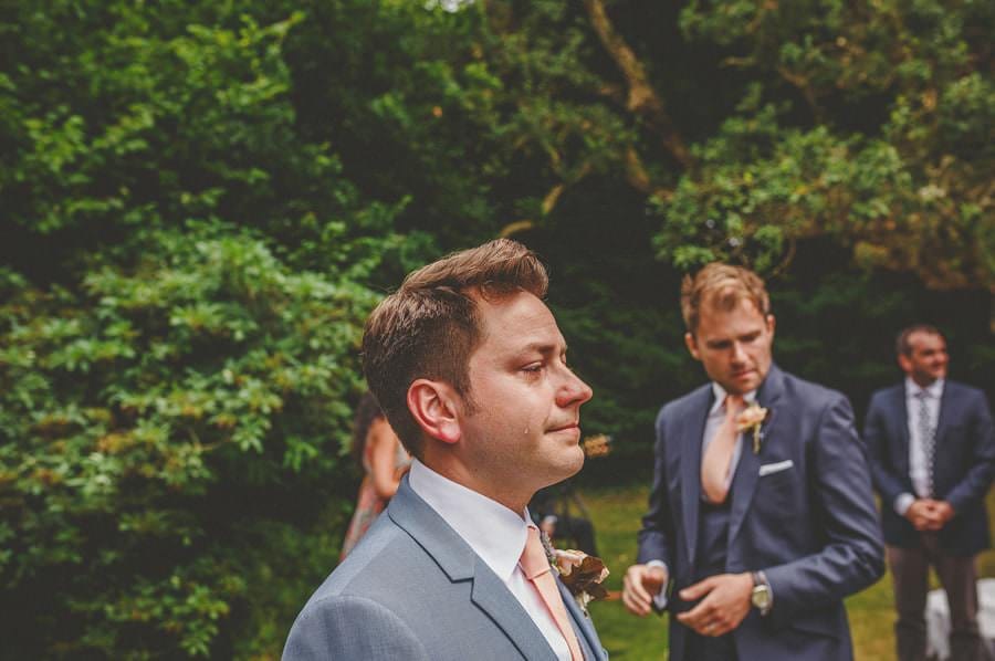 The groom cries as he sees the bride for the first time