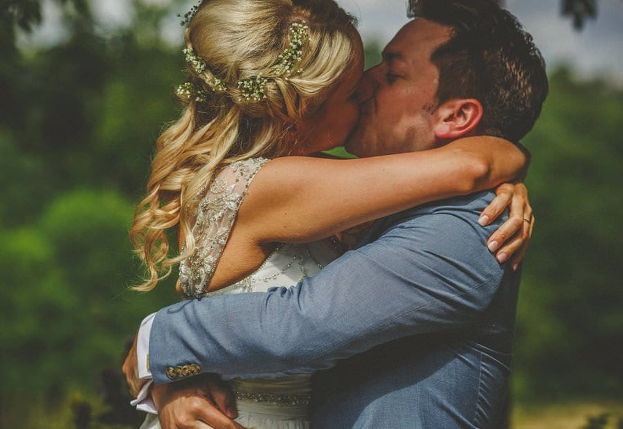 The bride and groom kiss for the first time as husband and wife