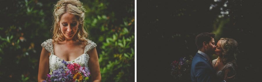 The bride looks at her bouquet and kisses her husband