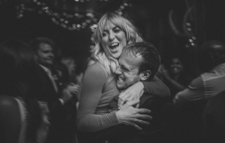 A man lifts up a lady on the dancefloor