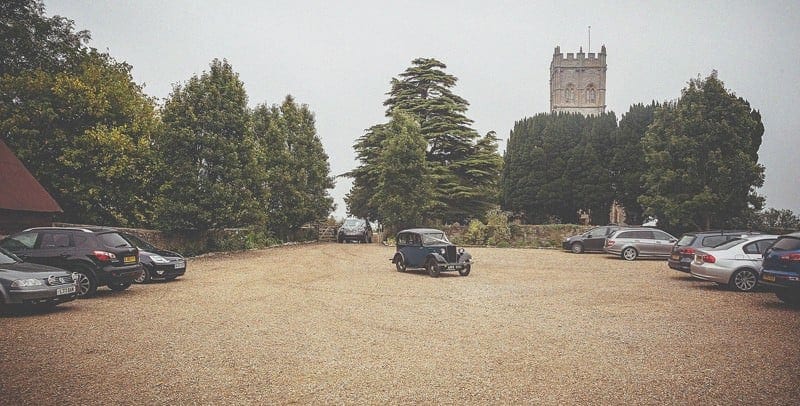 The vintage car arrives at Almonry Barn