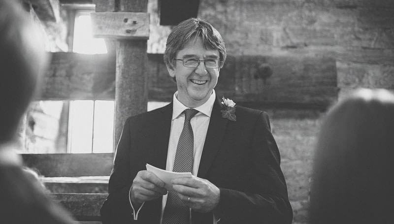 The brides father stands up and delivers his speech