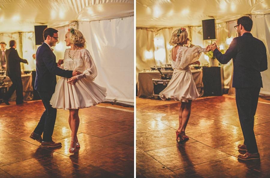 The bride and groom's first dance in the marquee at Sharpham Park