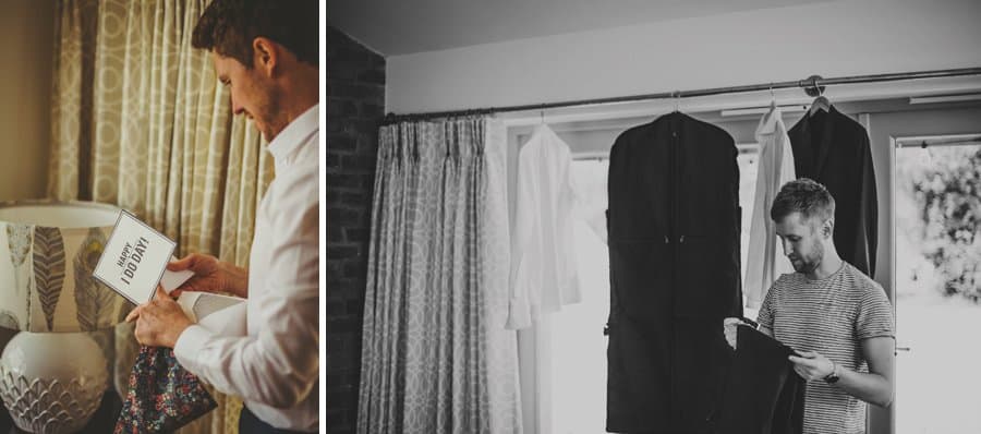 The groom reads a wedding card and an usher looks at his suit