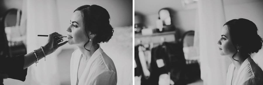 The make up artist applies lipstick to the lips of the bride