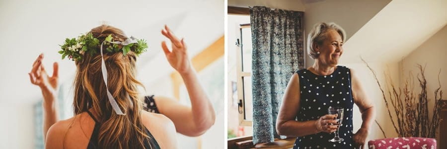 The brides mother places a flower hat onto the head of a bridesmaid