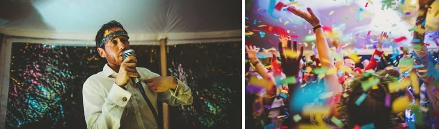 A wedding guest sings a song and a confetti canon is fired into the air inside the marquee