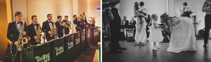 The wedding band play their instruments and the bride talks to the flowergirl on the dance floor