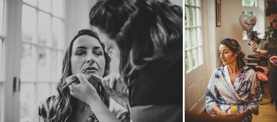 The make up artist applies lipstick to the bride