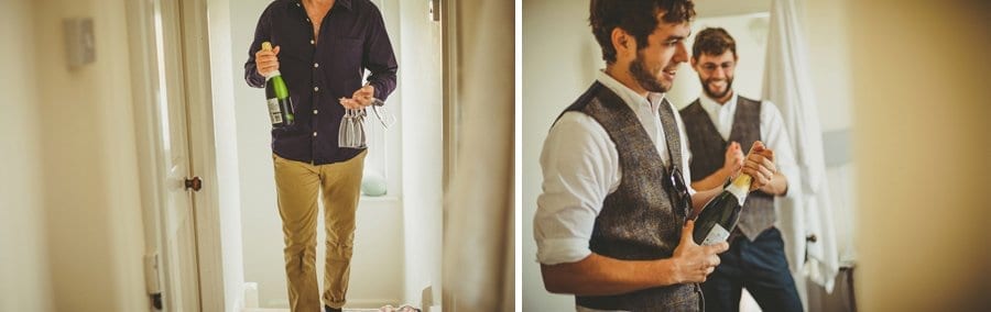 The champagne arrives and the groom opens the bottle