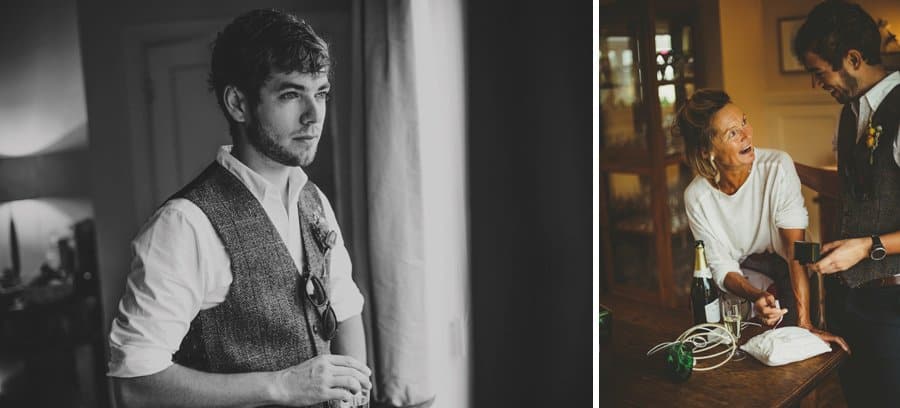 A portrait of the groom next to a window