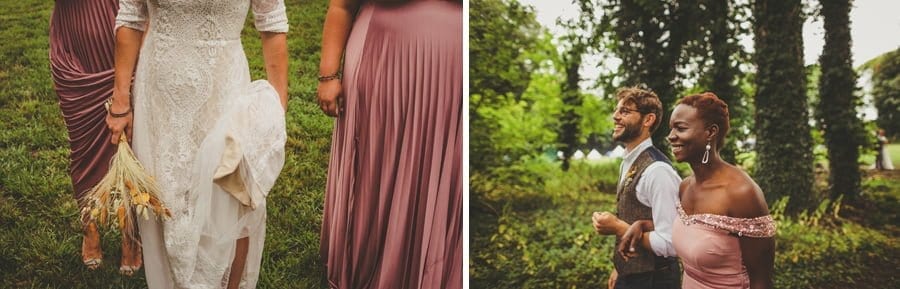 The brides flowers and the rest of the wedding party walk into the woods