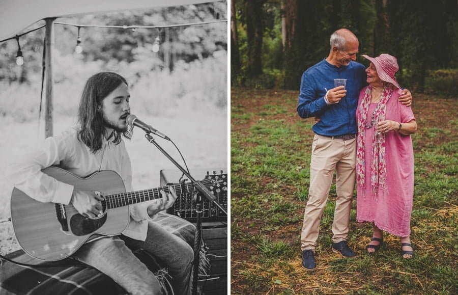 A man plays and acoustic guitar and the grooms father places his arm around his mother