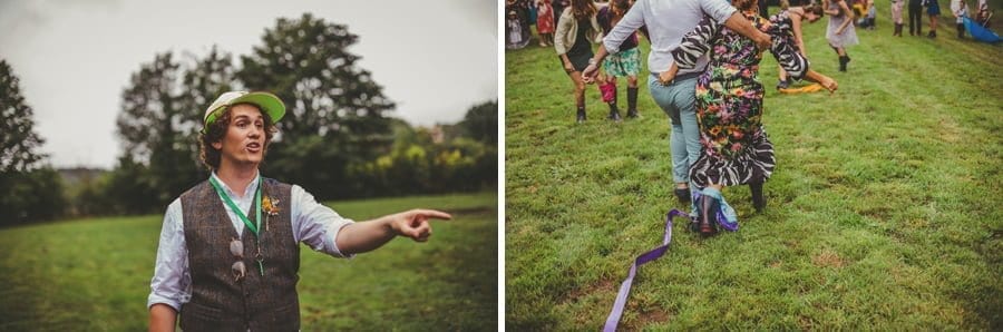 An usher points to the wedding guests who are running across the field