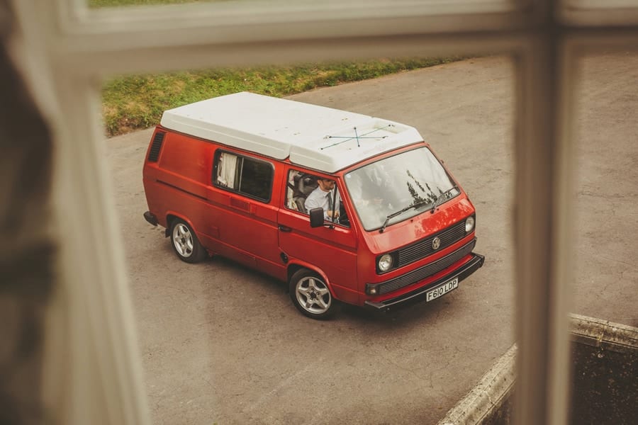 The grooms Volkswagen arrives and parks outside Barley Wood house in Bristol