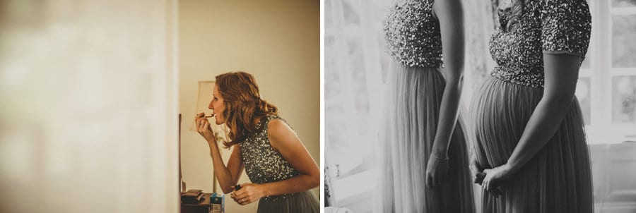 A bridesmaid looks in the mirror and puts lipstick on her lips