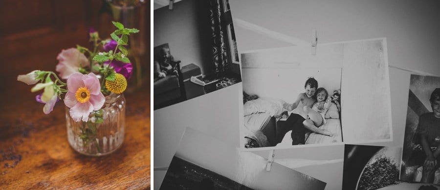Flowers in a glass on a window ledge and a black and white photograph of the groom as a young boy