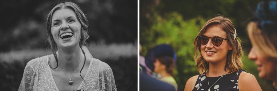 The bride laughs and a wedding guest smiles