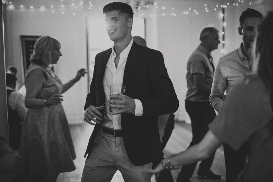 A wedding guest dancing on the dance floor