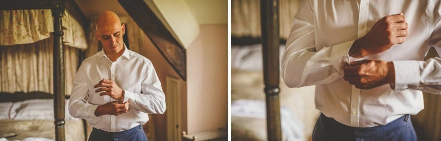 The groom fastens his cufflinks