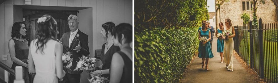The bride and her bridesmaids walk out of the cottage towards Abbey house Gardens