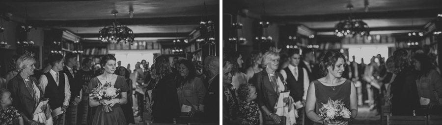 The bridesmaids walk down the aisle