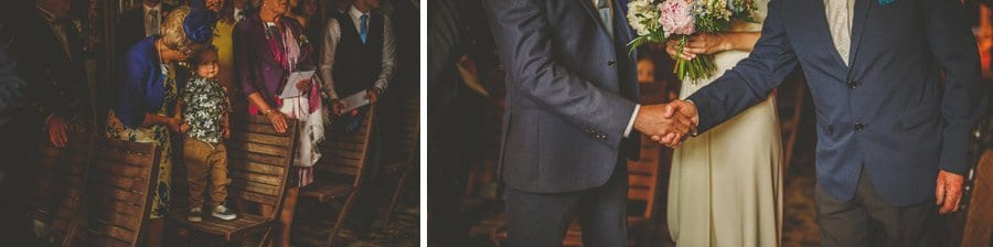 The groom shakes the brides fathers hand